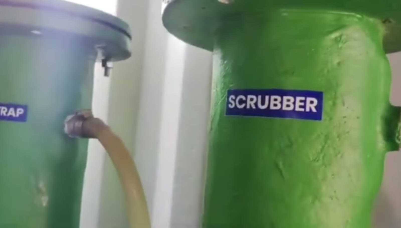 Moisture trap and biogas scrubber